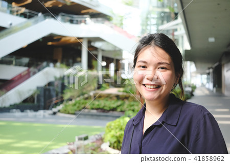Close up of Asian woman smiling. Close up of Asian woman smiling. 41858962