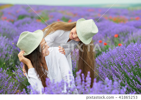 young woman and girl are in the lavender field 41865253