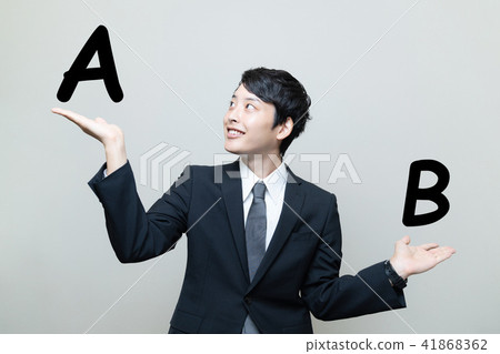 A man who compares A and B 41868362