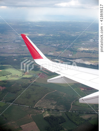 airplane wing from passenger window low flight 41869817
