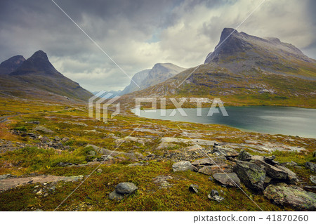 Rocky shore of mountain lake, Norway. Rocky shore of mountain lake, Norway. 41870260