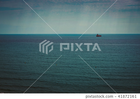 Container ship at anchor on the horizon 41872161