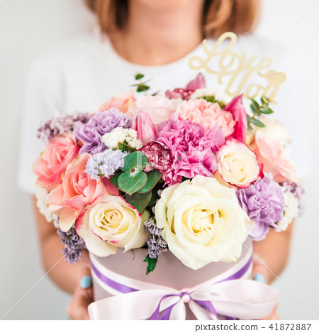 Beautiful bouquet in woman hand Beautiful bouquet in woman hand 41872887