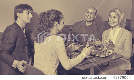 Positive middle class people enjoying food and wine 41879064