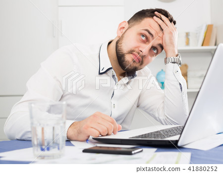 Man having problem in office Man having problem in office 41880252