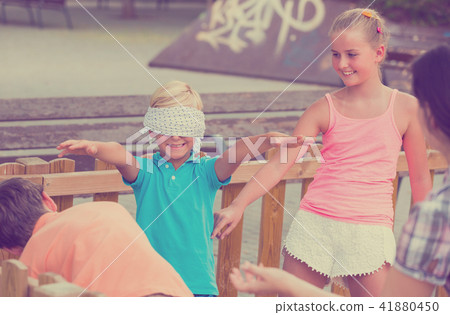 Kids are playing in blindfolders Kids are playing in blindfolders 41880450