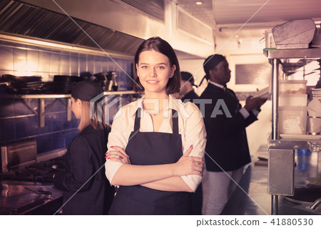 Confident waitress in restaurant kitchen 41880530