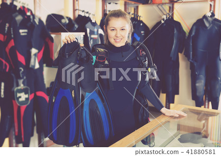 Woman is standing in new equipment for diving Woman is standing in new equipment for diving 41880581