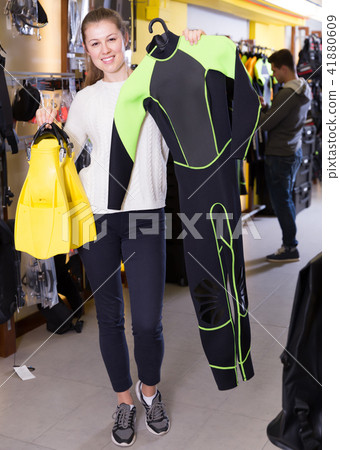 Sporty female is satisfied of diving equipment Sporty female is satisfied of diving equipment 41880609