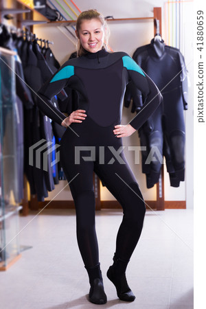 Woman is posing in new costume for diving Woman is posing in new costume for diving 41880659