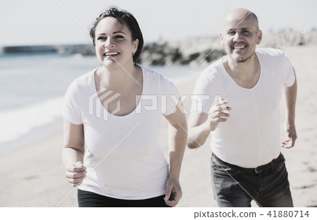 Couple jogging together outdoor Couple jogging together outdoor 41880714