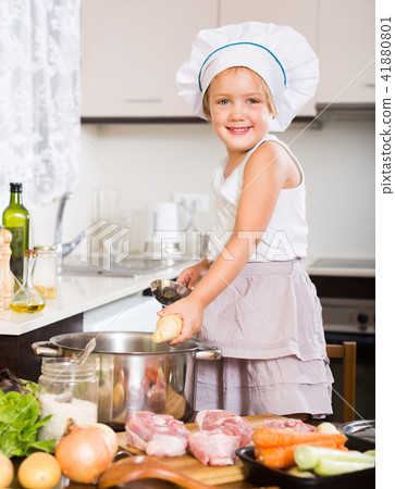 Baby girl cooking with meat 41880801