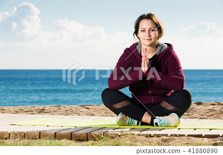 woman working out in beach 41880890