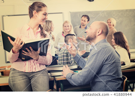 Professor consulting different age students Professor consulting different age students 41880944