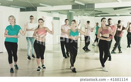 adults of different ages dancing at dance class 41881114