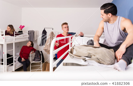 Two men talking in hostel Two men talking in hostel 41882306