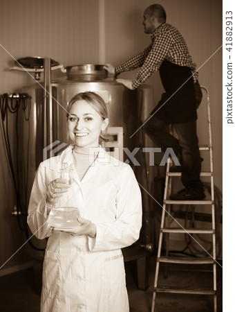 Two brewery workers on beer factory. 41882913