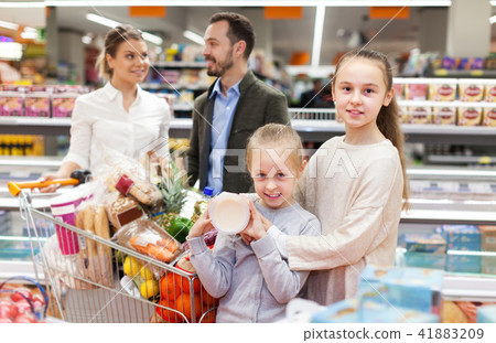 Family with purchases in supermarket Family with purchases in supermarket 41883209