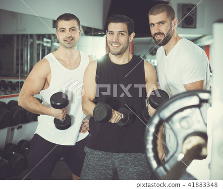 Three guys in training room Three guys in training room 41883348