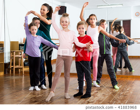 Little boys and girls having dancing Little boys and girls having dancing 41883968