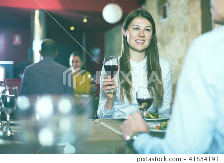 colleague on friendly meeting over dinner 41884191