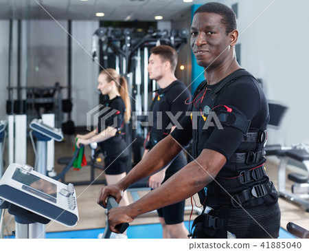Portrait of athletic African American man during EMS workout in fitness gym 41885040