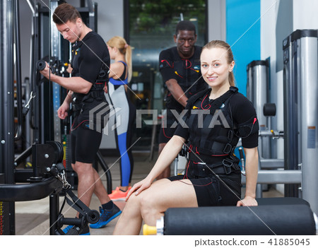 guys and girls performing full-body ems training guys and girls performing full-body ems training 41885045