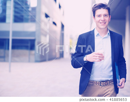 Portrait of cheerful male with documents 41885653