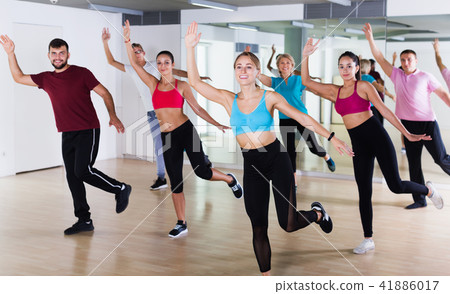 adults of different ages dancing at dance class 41886017