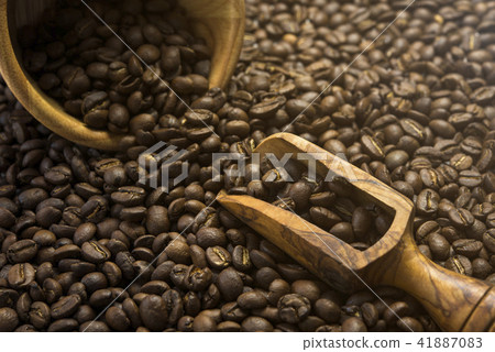 coffee beans in a wooden scoop and bowl coffee beans in a wooden scoop and bowl 41887083