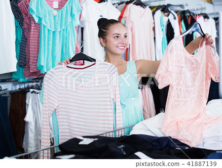 Woman shopping at the apparel store Woman shopping at the apparel store 41887139