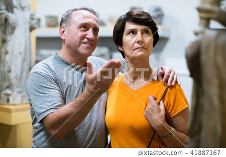 Mature couple visiting historical museum Mature couple visiting historical museum 41887167