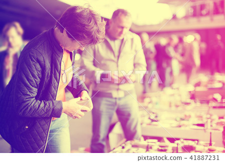 Woman visiting flea market 41887231