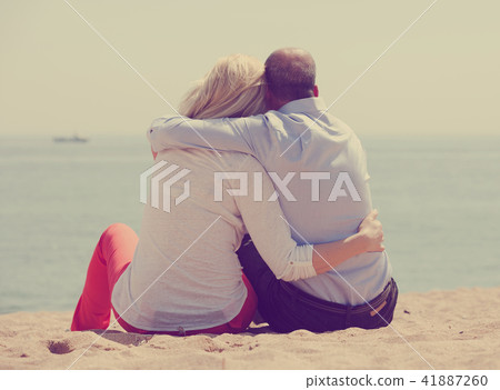 Rear view of senior man and woman together 41887260