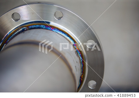 Steel weld joined pipe to plate by arc welding Steel weld joined pipe to plate by arc welding 41889453