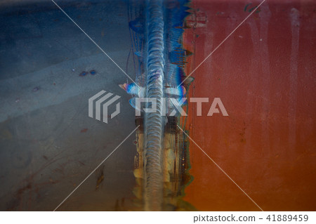 Steel weld joined pipe by arc welding process . 41889459