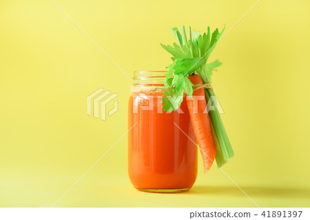 Organic carrot juice with carrots, celery on Organic carrot juice with carrots, celery on 41891397
