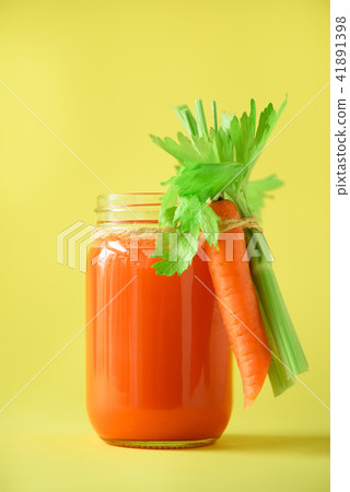 Organic carrot juice with carrots, celery on Organic carrot juice with carrots, celery on 41891398