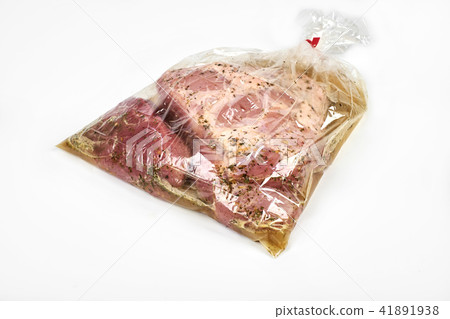 fresh meat packaged in a sleeve with spices, for baking is ready for baking, isolated on white 41891938