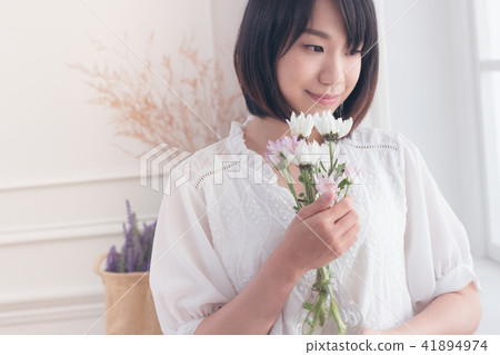 Girl and flowers Girl and flowers 41894974
