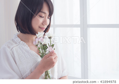 Girl and flowers Girl and flowers 41894978