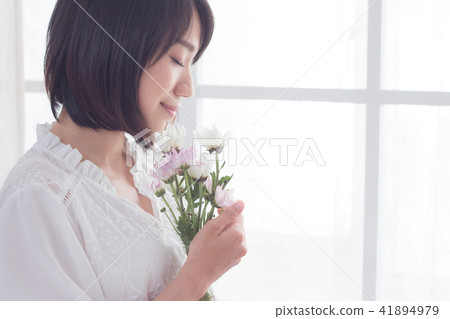 Girl and flowers Girl and flowers 41894979
