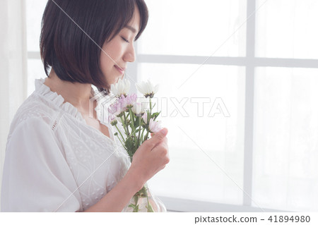 Girl and flowers Girl and flowers 41894980