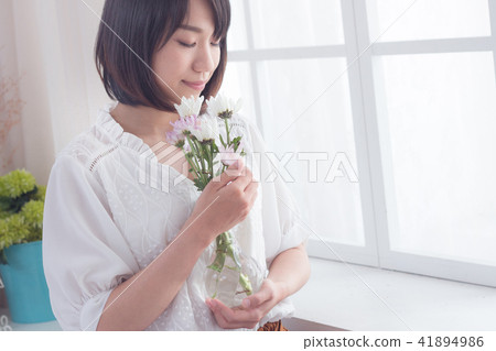 Girl and flowers Girl and flowers 41894986
