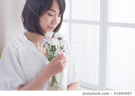 Girl and flowers Girl and flowers 41894987