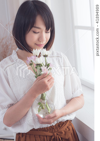 Girl and flowers Girl and flowers 41894989