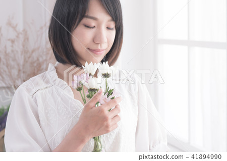 Girl and flowers Girl and flowers 41894990
