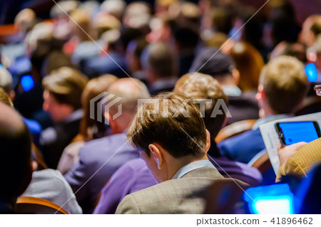 People attend business conference in congress hall 41896462