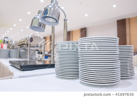 Set of dishes for dinner party at banquet table Set of dishes for dinner party at banquet table 41897630