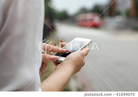 woman using mobile smart phone woman using mobile smart phone 41899070